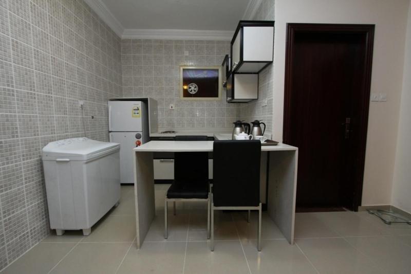 Nuzol Tala Hotell Khafji Rum bild